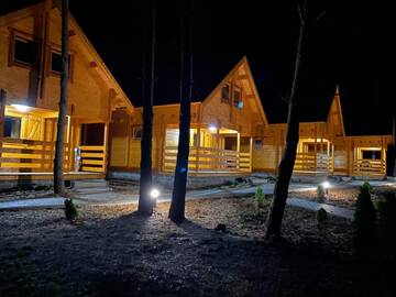Фото номера Шале с двумя спальнями Лоджи Domki Wiosełko г. Cieksyn 11